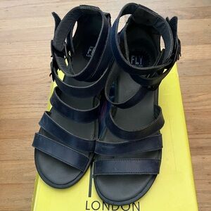 Fly London, strappy  blue sandals

CEDA Rug Blue.